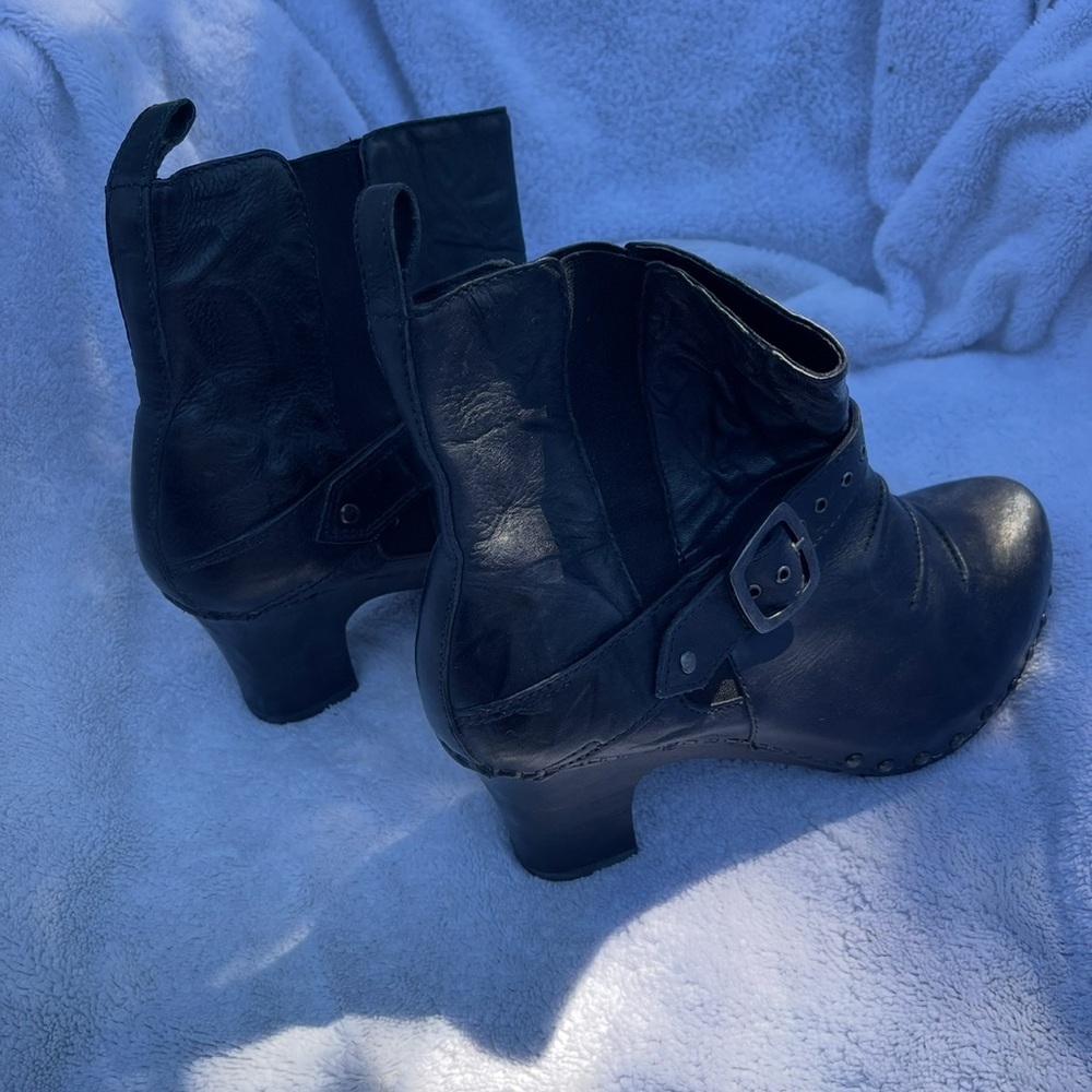 Dansko Black Heeled Boots with Sleek Buckle Accents